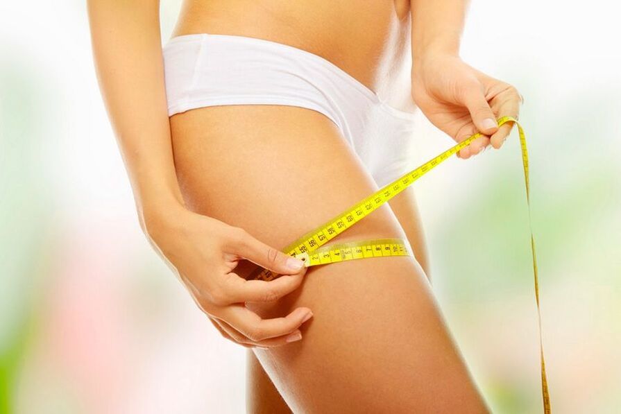 Girl measures his thigh volume